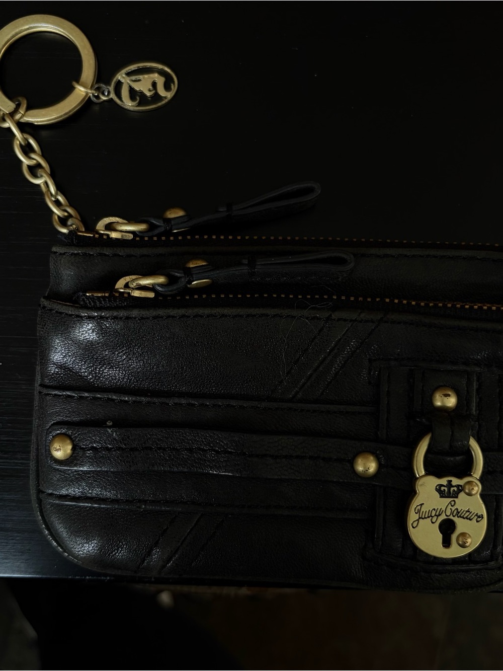 Juicy Couture Black Leather Wristlet with Gold Accents and Padlock Charm